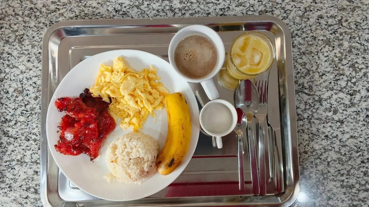 Tosilog at OIA Suites Moalboal: sweet cured tocino with scrambled eggs, garlic rice, a banana, coffee and orange juice