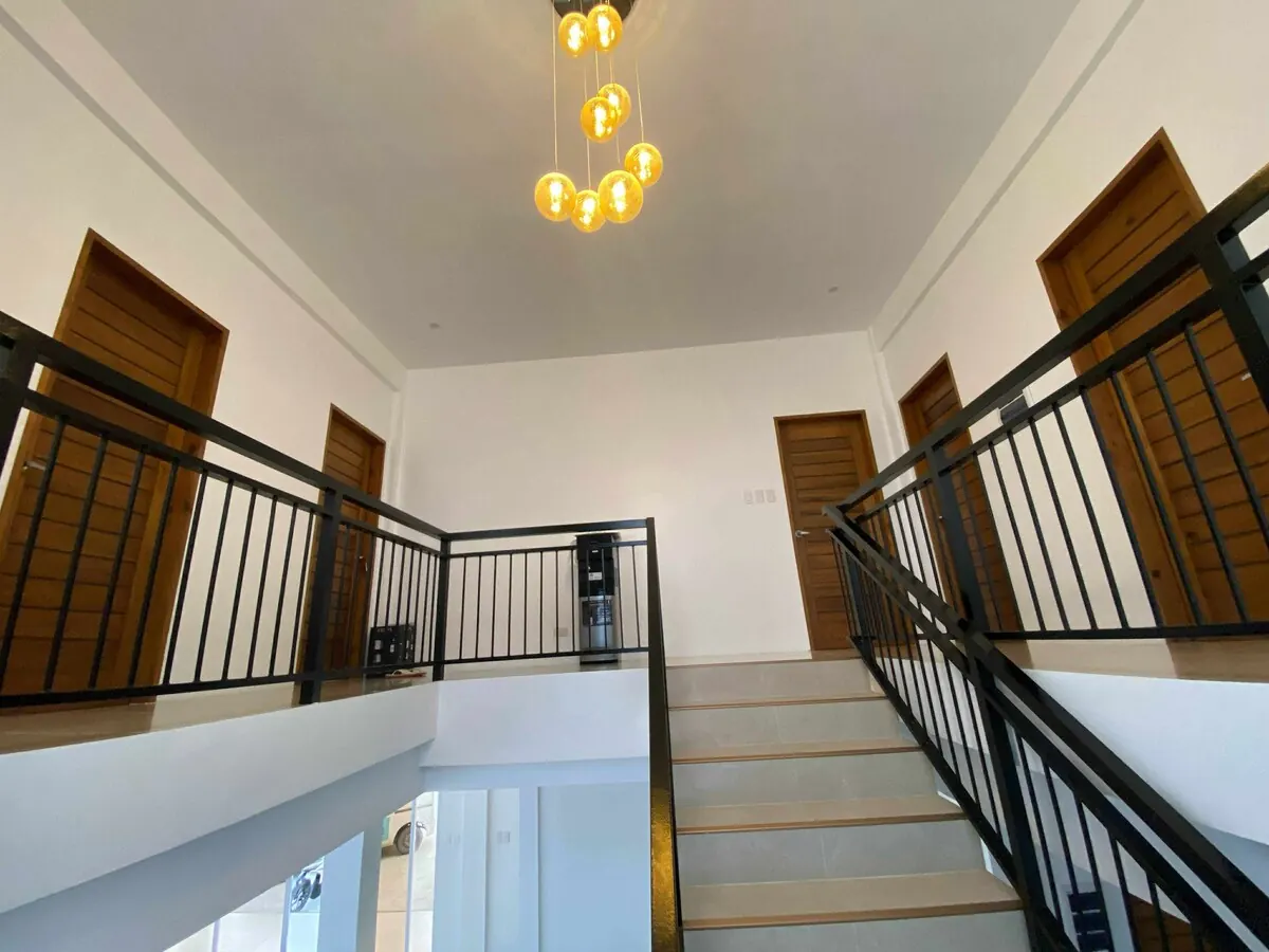 Hallway on the first floor with the six suite doors