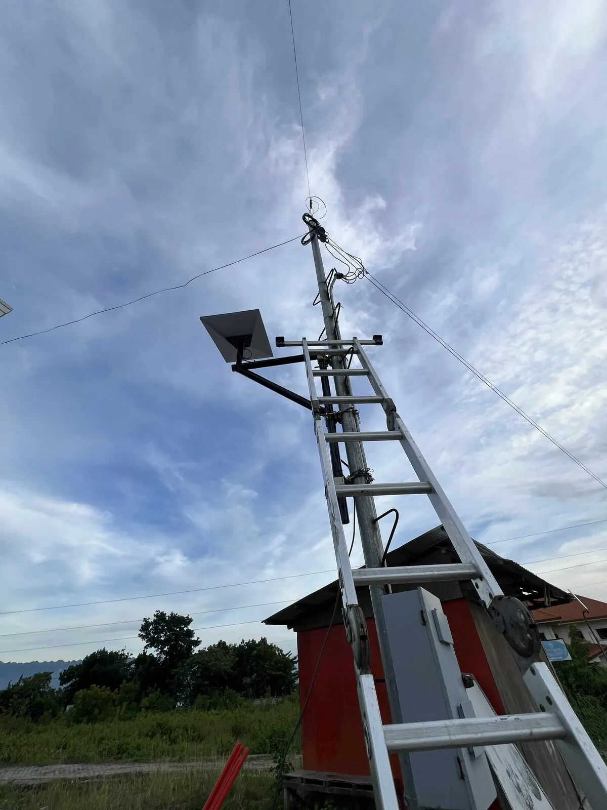 Starlink dish mounted above the house as backup internet